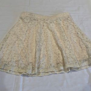 Cream lined lace mini skirt